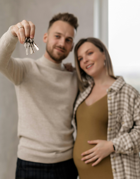 Home buyers with keys